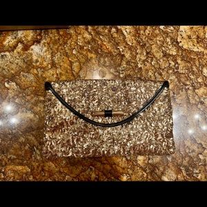 Jimmy Choo gold glitter clutch